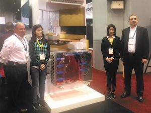 Panasonic sales managers with representatives from CY Distributing, a ductless split distributor, in front of Panasonic’s ductless mini-split solution for cold climates.