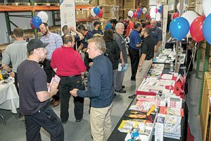 Vendors and Customers pack the warehouse floor during Spring Fling 2018