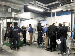 Hands-on, live-equipment training at an Air Purchases training academy