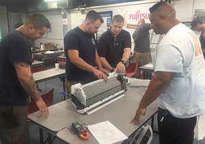 Air Purchases DQI Chris Kowalczyk works with contractors in the Fujitsu EDTT class.