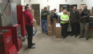 Allen Coggins explains the Thermasi units which were donated to the Arnold Food Pantry to support their work in the community. These units may also be run on solar energy, a feature that the food bank hopes to take advantage of in the future.