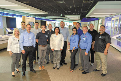 The group prepares to tour the UTC Center for Intelligent Buildings