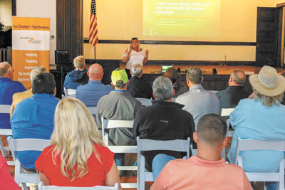 Paula Huband speaks at GACCA meeting.