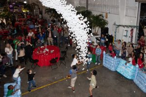 2,000 cotton snowballs tumble down from the ceiling.