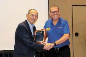 Charles Del Vecchio is presented the SFACA Distinguished Service Award by 2019 SFACA President Skip Farinhas