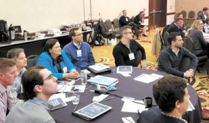 Participants of the inaugural AIM/R Rep Advantage listening to the opening keynote presenter, Dirk Beveridge, UN!eash, on Thurs., March 7th in Rosemont, Illinois.