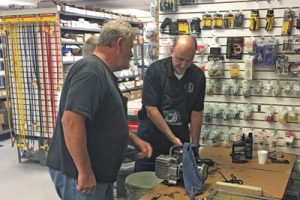 Keith Holland (r.) of Leone Green and Associates conducts a clinic in Daytona Beach.