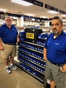 Jim Cherry and Oscar Hernandez with the Parker Zoomlock bin.
