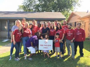 Lennox Feel The Love team members helped install a new AC system for recipient Jackie Lewis (middle), a kidney transplant patient in Dallas who had to stop working because of health issues.