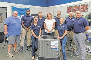 Front: Courtney Whitaker, Courtney King and Linda Morales, Back: Evan Combs, Seti June, Tom Campbell, Lander Claassen, Matthew Giesey and Jeremy Barnes of Ferguson in Orlando.