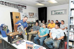 Gil Ledoux of PED Associates conducts an aluminum coil repair class.