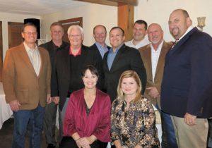 Standing from left to right: Clay Schweizer; Paul Trammell; Louis Schweizer; Matt Bourgeois; Felix Gort; Pete Cerise; Chris Taylor; Paul Boeckl Sitting from left to right: Melissa Tardo; Linda McPhate.