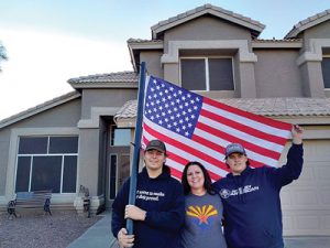 Annie Patterson with sons John Ryan (left) and William (right) celebrate winning Forrest Anderson's 2020 Military Hero AC Giveaway.