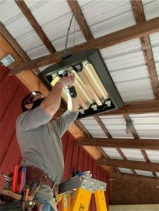Marley radiant heaters being installed outdoors at the Two Twisted Posts (TTP) Winery in Purcellville, Va.
