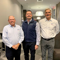 Johnstone Supply the Ware Group (CEO) Henry Puente, (President) Mike Bell and (Chairman) Chris Ware